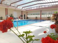 ÁTICO DELUXE entre CENTRO y PLAYA Salinas con TERRAZA, WIFI, PISCINA climatizada, GYM, SAUNA y GARAJE -Smart TV - Chambres d'hôtes Roquetas de Mar
