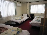Quadruple Room with Shared Bathroom