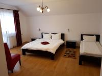 Dreibettzimmer mit Balkon