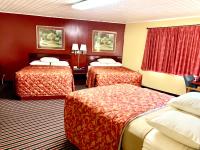 Chambre Triple avec 3 Lits Doubles - Non-Fumeurs