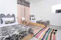 Chambre Double ou Lits Jumeaux - Vue sur Piscine