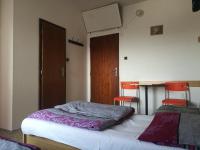 Camera Doppia con Letti Singoli