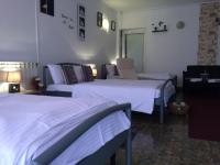 Quadruple Room with Shared Bathroom