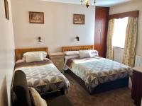 Chambre Triple avec Salle de Bains Commune