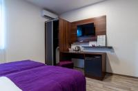 Chambre Double Deluxe (2 Adultes + 1 Enfant)