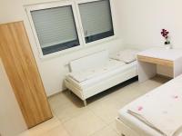Zweibettzimmer mit eigenem Bad