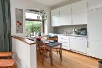 Kanalvilla - Urlaub am Nord-Ostseekanal - zwei Ferienwohnungen im Angebot- eine im Dachgeschoss und eine Wohnung mit Garten - B&B Sehestedt