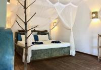 Habitación con cama extragrande.
