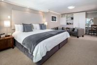 Zweibettzimmer oder Zimmer mit Kingsize-Bett und Meerblick