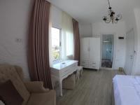 Camera Matrimoniale Deluxe (2 Adulti + 1 Bambino) 