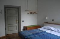 Doppel- oder Zweibettzimmer mit Gartenblick