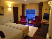 Kamer met Kingsize bed en Bubbelbad
