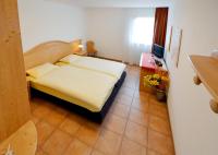 Tweepersoonskamer met 2 Aparte Bedden