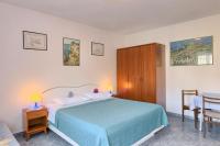 Monolocale con Divano-Letto