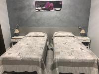 Doppel- oder Zweibettzimmer