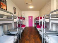 Bed in 10-Bed Female Dormitory Room with Shared Bathroom