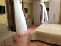 Chambre Quadruple avec Salle de Bains Privative