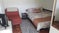 Doppelzimmer mit Blick auf den Garten und den See