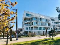 Biały apartament z tarasem w Playa Baltis - B&B Międzyzdroje