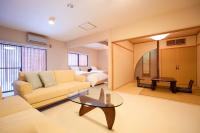 Zimmer mit Tatami-Bereich und Thermalquellen-Badewanne