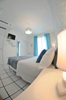 Doppelzimmer mit Balkon und Meerblick