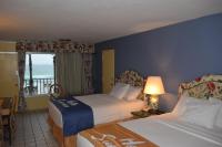 Queen Room with Two Queen Beds and Beach View - Non-Smoking