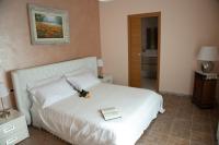 Kamer met Kingsize Bed en Uitzicht op de Tuin