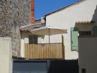Appartement centre historique avec Terrasse au porte de la Camargue - Chambres d'hôtes Saint-Gilles