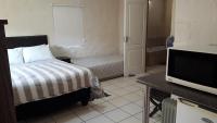 Habitación Doble Deluxe (1 adulto + 1 niño)