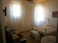 Dreibettzimmer mit Bergblick