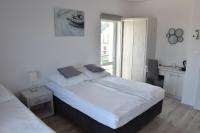 Dreibettzimmer mit Balkon