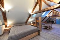 LOFT SOUS LES COMBLES - LOFT UNDER THE RAFTER - Ferienwohnung Rodez