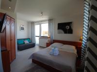 Deluxe tweepersoonskamer met balkon en uitzicht op zee