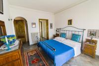 Zimmer mit Queensize-Bett und Meerblick