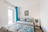 Two-Bedroom Apartment with Balcony and Sea View