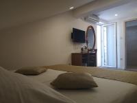 Chambre Triple avec Balcon - Mansarde