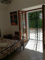 Kamer met Kingsize Bed en Uitzicht op de Tuin
