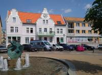 Apartamenty Pod Zegarem - Chambres d’hôtes Mikołajki