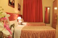 Camera Matrimoniale/Doppia con Letti Singoli con Bagno in Comune