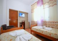 Camera Standard Doppia con Letti Singoli con Bagno in Comune