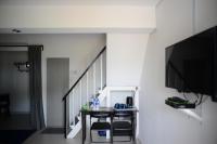 Camera Familiare con Vista Giardino