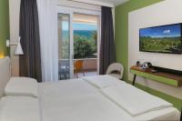 Tweepersoonskamer met 1 of 2 Bedden en Balkon