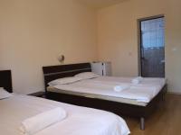 Dreibettzimmer mit Balkon