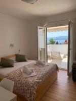 Doppelzimmer mit Balkon und Meerblick