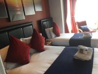 Chambre Double ou Lits Jumeaux - Vue Partielle sur Mer
