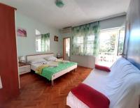 Habitación Doble con balcón y zona de cocina