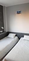 Camera Standard Doppia con Letti Singoli con Bagno in Comune