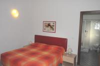 Doppel- oder Zweibettzimmer