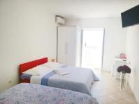 Camera Familiare con Vista Mare
