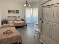 Dreibettzimmer mit Balkon